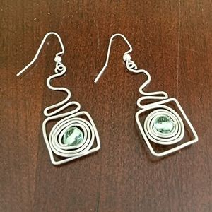 Handcrafted Hippie Boho drop wire work earrings, with a greenish glass bead.